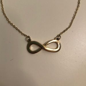 Gold infinity sign necklace